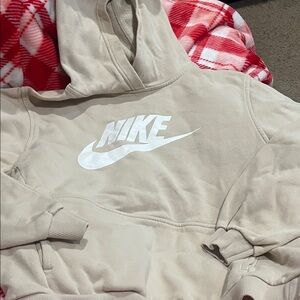 B58 Girls’ XL Nike Beige Hoodie with White Logo; 1 mark